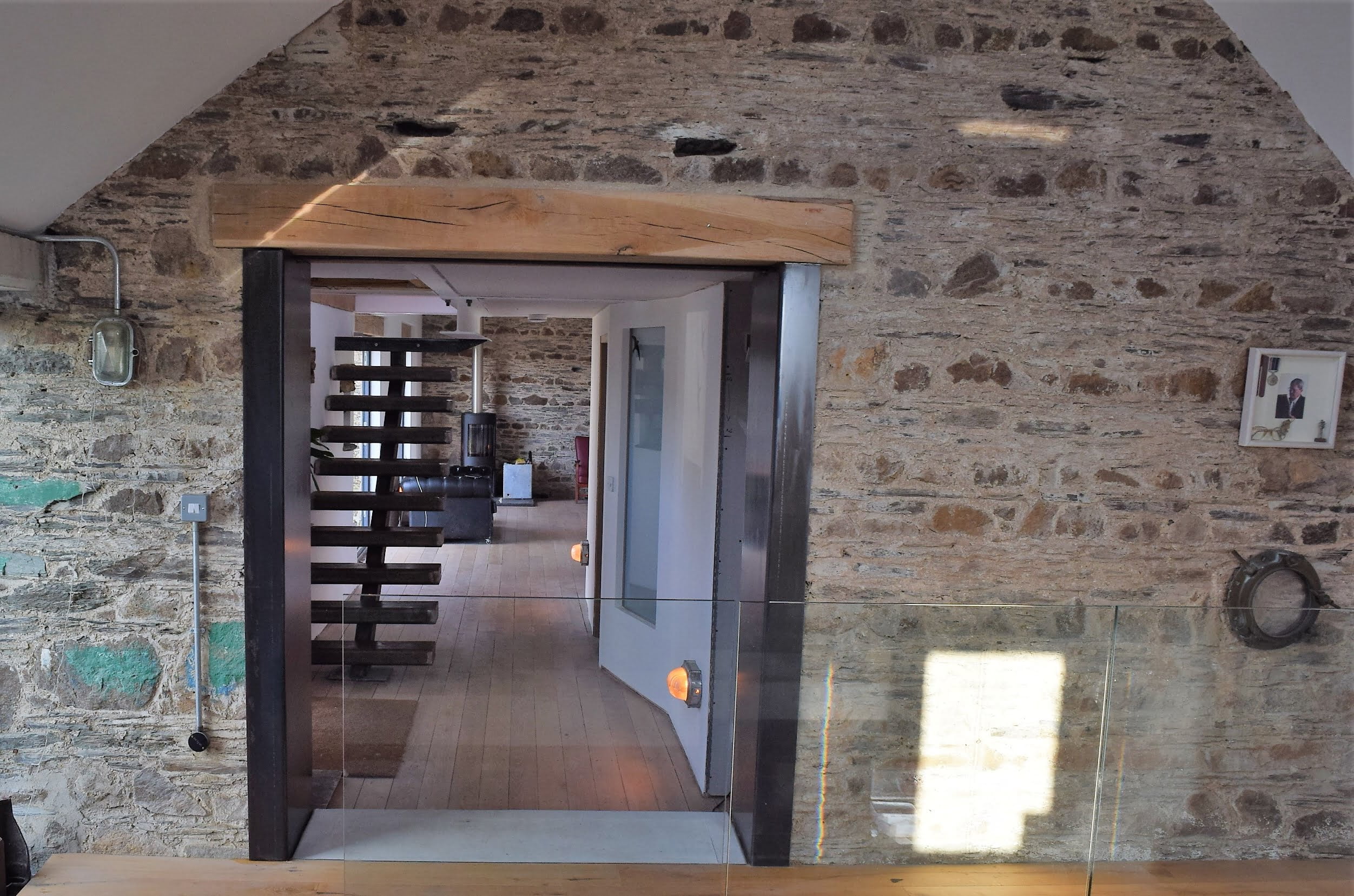 Industrial style staircase in barn conversion in Cornwall by Westcountry Fabrication Limited