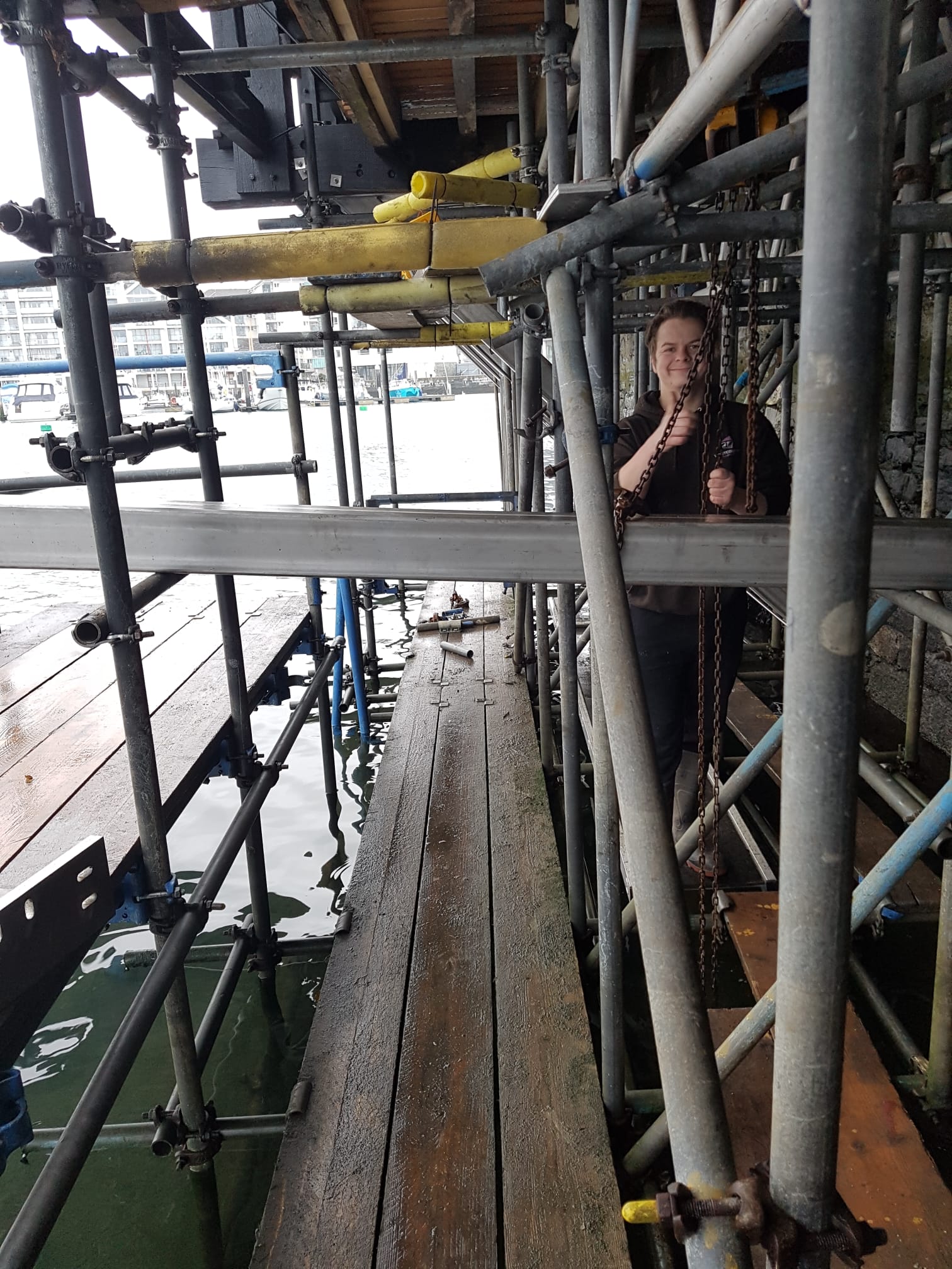 Jay Hart, Westcountry Fabrication Ltd, working fitting steelwork in Plymouth harbour