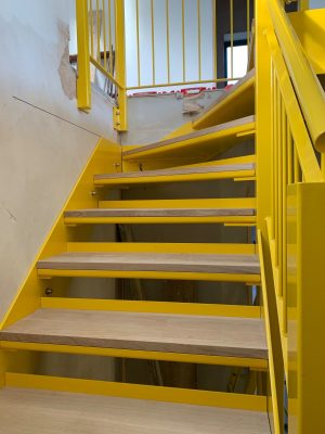 Yellow powder coated steel stairs