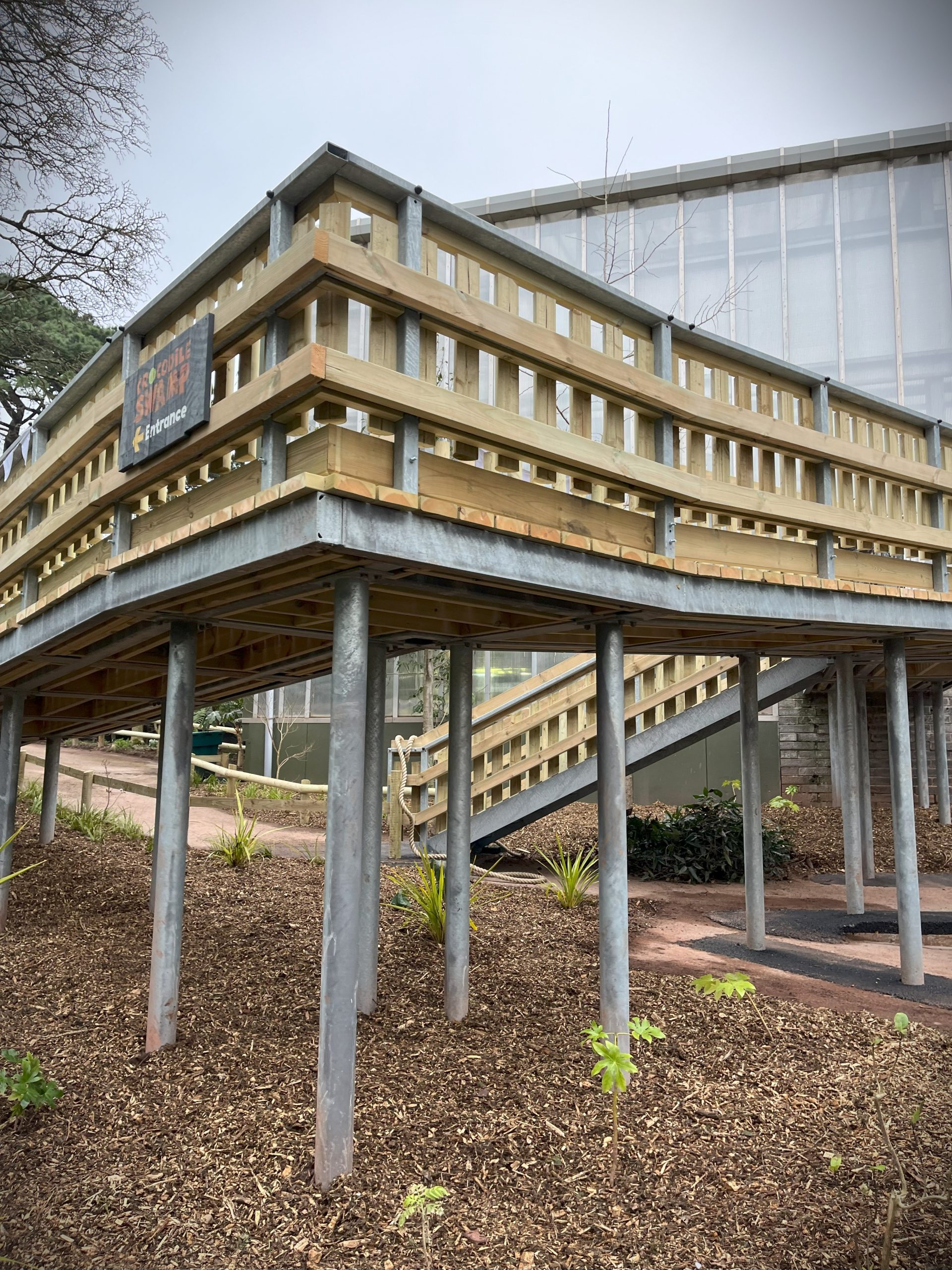 Galvanised steel posts supporting access ramp clad in wood at Paignton Zoo